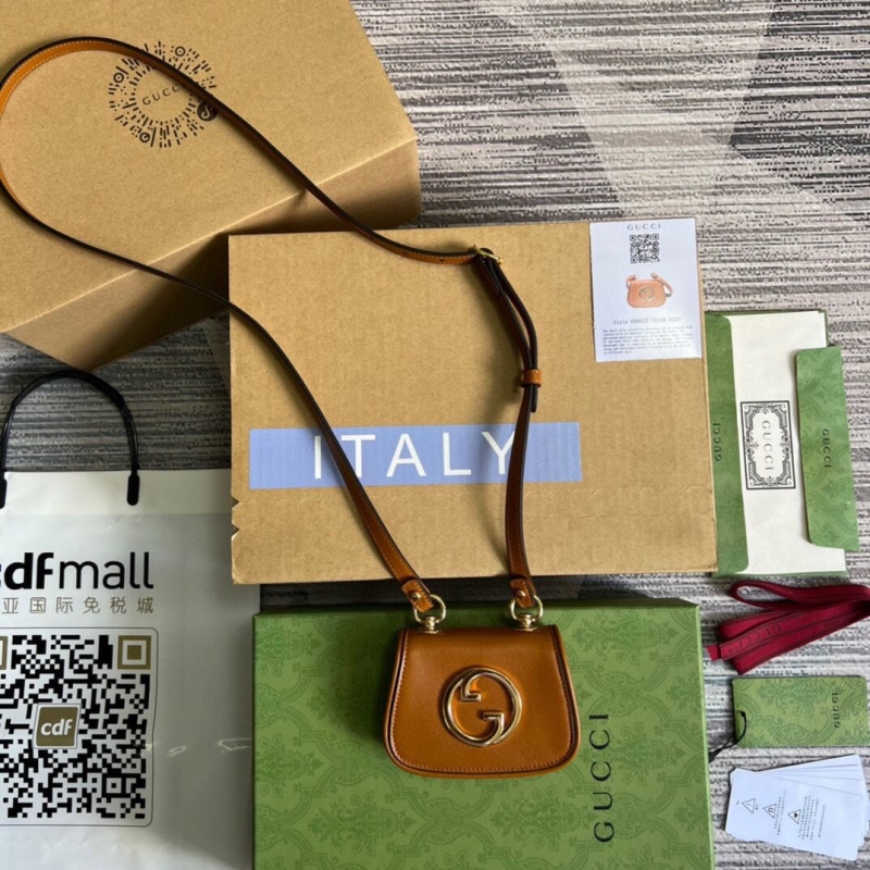 G*u*i satchel bags